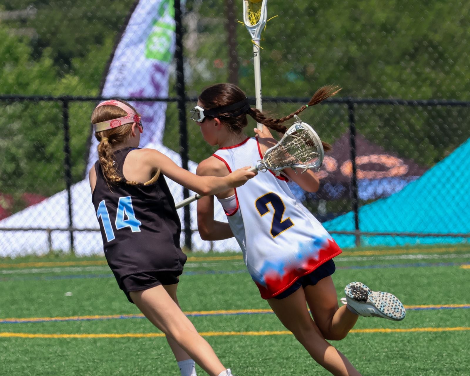 Players driving toward goal