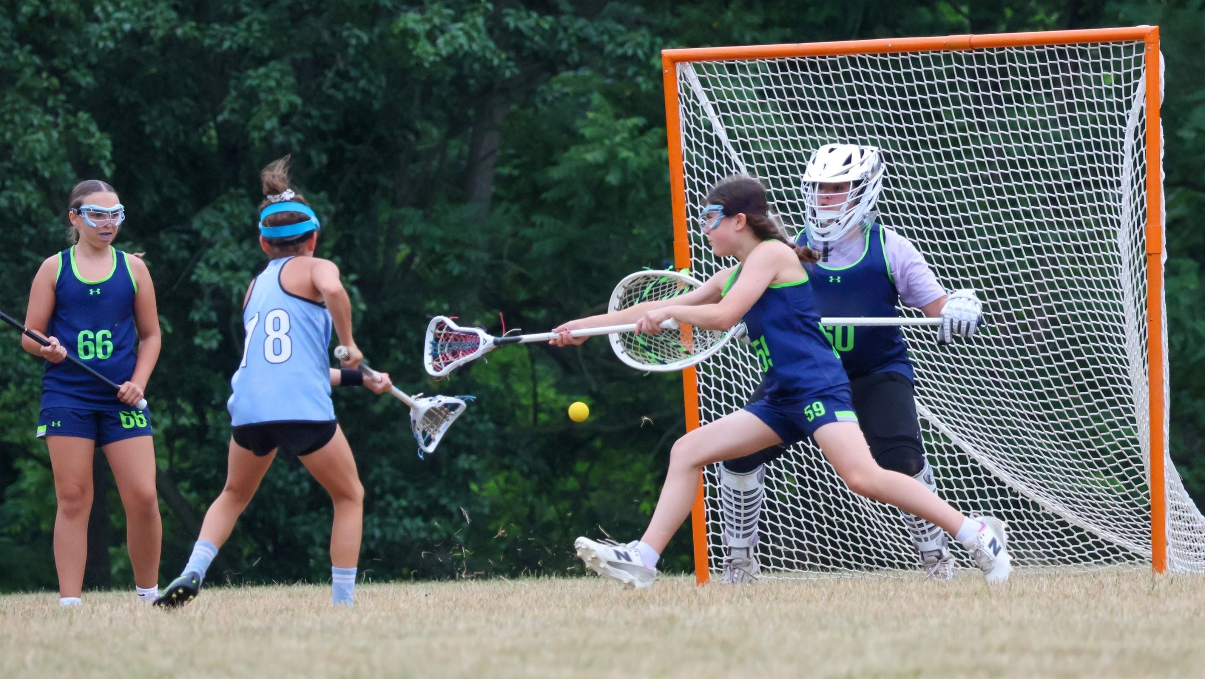 Defender blocking a shot